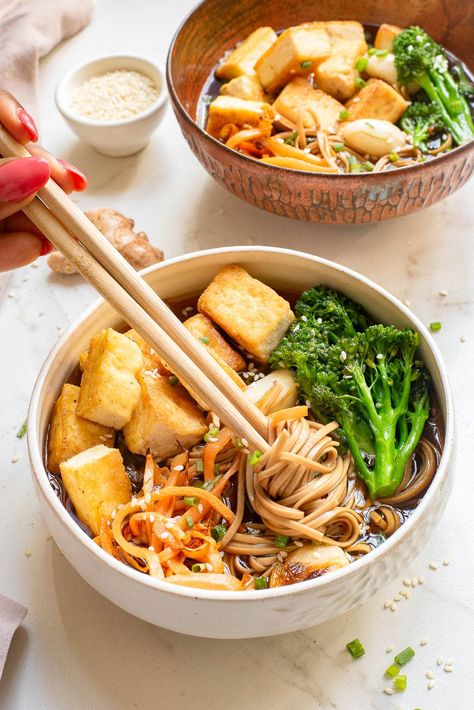 This bowl of Soba Noodles in Miso Soup is more than just a quick meal—it’s a perfect balance of earthy miso, tender soba, and fresh veggies, all tied together with hearty tofu. The miso broth is subtle but full of depth, letting the nuttiness of the soba come through while the vegetables and tofu add both texture and flavor. Soba Noodle Soup Recipe, Miso Soba Noodle Soup, Veggie Miso Soup, Toshikoshi Soba, Soba Noodle Recipe, Veggie Pad Thai, Soba Noodle Soup, Soba Noodles Soup, Salmon Noodles