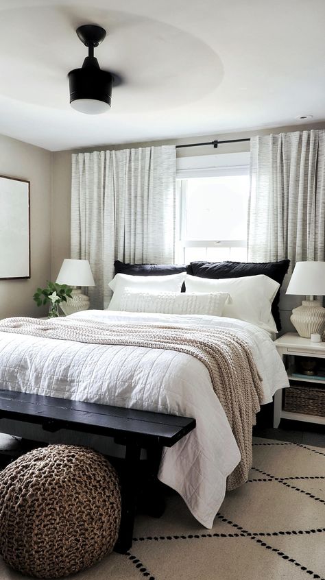 How to Make the Perfectly Cozy, Layered Bed - Made by Carli King Bedroom Ideas In Front Of Window, Master Bed Infront Of Windows, King Size Bed In Front Of Window, Small Bedroom Ideas King Bed, Beds By Windows Ideas, King Bed Under Window Ideas, Dark Grey Bedframe Bedroom, Queen Bed Under Window, Bedroom Against Window