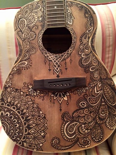 Wood burn guitar by Aimee Decorate Guitar Ideas, How To Decorate A Guitar, Paint Guitar Ideas, How To Paint Guitar, Wood Burned Guitar, Painting On Guitar Ideas, Guitar Design Art, Tattoo Music Ideas, Guitar Design Ideas