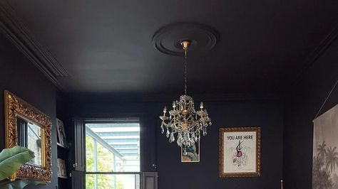 The Ceiling Painting Hack That Makes Any Room Look Bigger Painting Bathroom Ceiling Dark, Low Ceiling Paint Ideas, Black Walls And Ceiling, Painting A Room, Room Look Bigger, Ceiling Painting, Bathroom Ceiling, Dark Walls, Black Ceiling