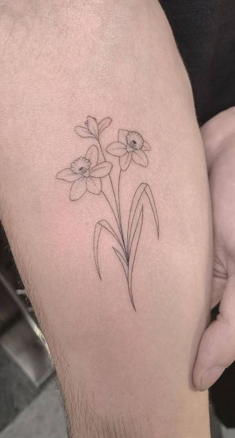 Daffodil Dog Tattoo, Tattoo Ideas Female Daffodil, Daffodil Bunch Tattoo, Minimalist Narcissus Tattoo, Dafodill Flowers Tattoo Simple, Dafidol Flowers Tattoo, Daffodil Line Tattoo, Daffodil Fine Line Tattoo, Daphadil Tattoo