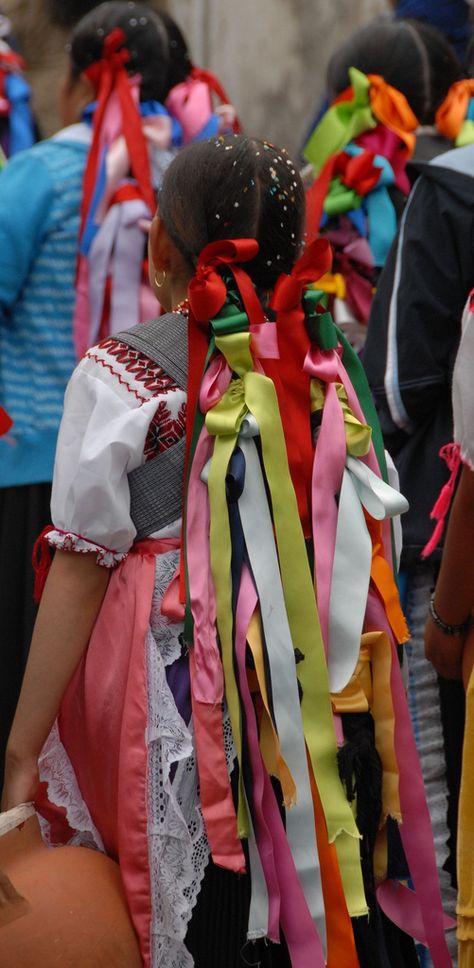 The Purepecha women participating in a festival in Charapan Michoacan have tied colorful ribbons in their braided hair Mexican Braids With Ribbon, Urban Soldier, Mexican Braids, Braids With Ribbon, Mexican Beauty, Mexican Hairstyles, Face Poses, Ribbon Braids, Mexican Fashion