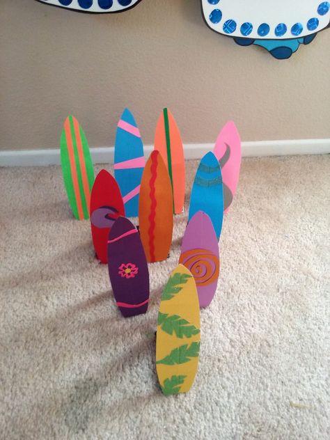 Lilo and stitch or Luau party. Hand made "surf board bowling" game Lilo And Stitch Crafts Preschool, Lilo And Stitch Preschool Activities, Lilo And Stitch Craft Ideas, Lilo Stitch Party Ideas, Tropical Party Diy, Lilo And Stitch Diy Decorations, Stitch Birthday Party Activities, Lilo And Stitch Birthday Party Activities, Diy Lilo And Stitch Decor