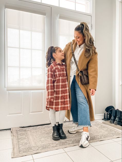 Effortless and chic outfit idea for cropped flare jeans and new balance sneakers. Picture of mama with daughter. White Oxford shirt paired with cropped flare jeans, sneakers, and coat. All items linked on LTK. Cropped Flare Jeans Outfit Sneakers, Flare Jeans With Sneakers, Flare Jeans And Sneakers, Cropped Flare Jeans Outfit, Hair Tips And Tricks, Cropped Jeans Outfit, Flare Jeans Outfit, Crop Flare Jeans, Crop Flare