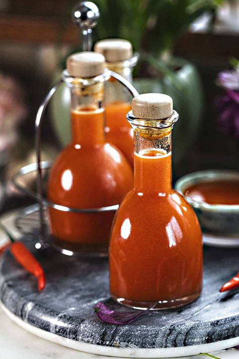 Easy Thai Hot Sauce Recipe (Homemade Sriracha) Thai Red Curry Fish, Hot Sauce Recipe Homemade, Red Curry Fish, Easy Thai Red Curry, Coconut Cream Uses, Homemade Sriracha, Thai Red Chili, Curry Fish, Hot Sauce Recipe