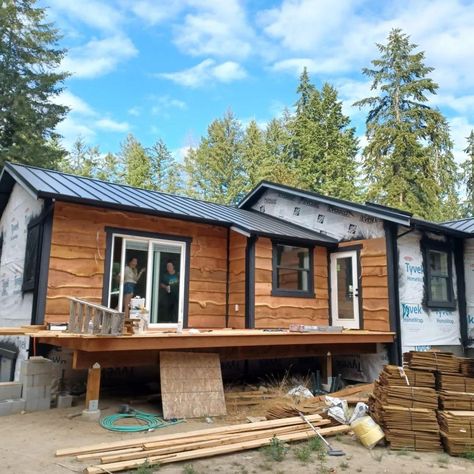 Wood Cabin With Black Trim Exterior, Metal Roof Cedar Siding, Tan House Cedar Accents, Cedar Siding Accent Exterior, Siding With Black Trim, Wood Cabin Exterior, White House Black Trim Cedar Accents, Lodge Style House Plans, Exterior Cabin