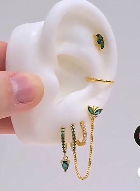 Eat Piercing Curation, Green Piercing Ear, Green And Gold Ear Piercings, Green Piercing Aesthetic, Eat Curation Ideas, Eat Curation, Eat Piercings Chart, Eat Piercings, Piercing Styling