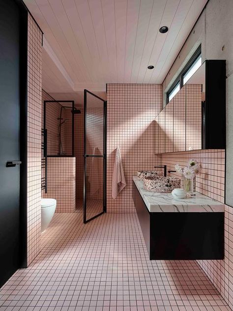 Contemporary pink and black bathroom with pink grid tiles and black grout features a black floating sink vanity with pink and black bowl sinks on a marble countertop, a walk in shower with black frame door and a black door. Terrazzo Sink, Monochromatic Interior Design, Monochromatic Room, White Wall Tiles, Vanity Design, Bay House, Custom Vanity, Concrete House, Waterfront Homes