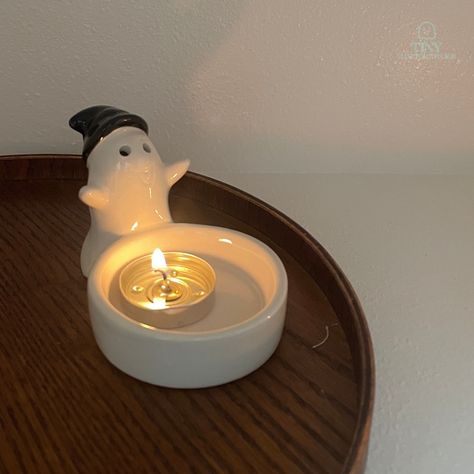 🧙‍♂️✨ A little mid-week magic to get us through! Our tiny ghost has put on its wizard hat and is ready to cast a cozy spell from the corner of my desk. 🔮🔥 It’s amazing how something so small can bring a bit of whimsy and warmth to an ordinary Thursday. What’s bringing a little magic to your week? Share your enchanting moments with us! 💬🌟 #CeramicGhost#CandleDecor#HomeDecor#HalloweenVibes#SpookySeason#CandleLovers#GhostlyGlow#TrayDecor#FallDecor#CuteCandles#halloweenceramics#halloweenhomedec... Tiny Ghost, Ghost Candle, Ghost Candles, Wizard Hat, My Desk, To Cast, Incense Burner, Wizard, Candle Holder