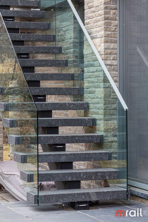 A spine like steel under mount stringer supports metal steps which are later wrapped with stone box liners. Metal stringers are usually painted or stainless steel. Balustrade Ideas, Staircase Balustrade, Steel Facade, Granite Stairs, Metal Steps, Basalt Stone, Stone Stairs, Metal Stairs, Steel Structure