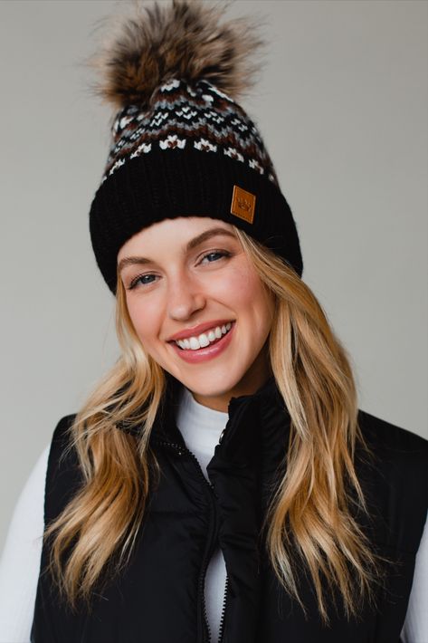 Patterned pom hats are the perfect way to top off your chilly weather looks! This black, white, brown and gray patterned knit pom hat is at the top of our lists this season. Pom Hats, Winter Pattern, Fair Isle Pattern, Winter Hats For Women, Chilly Weather, Pom Pom Hat, Grey Pattern, Pom Beanie, Fur Pom Pom