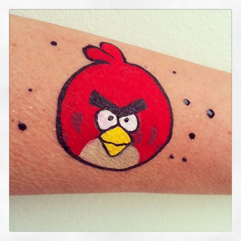 Angry Birds Face Painting Angry Birds Face Painting, Angry Bird Face Paint, Cheek Art Face Paint Simple, Easy Face Painting Ideas For Kids Simple Cheek Art, Face Paint On Arm, Bird Face Paint, Kids Face Painting Easy, Face Painting Halloween Kids, Face Painting Images