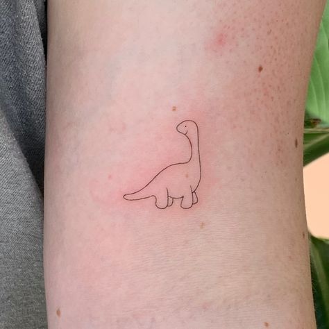 Is this not the most adorable little dino you've ever seen in your life!!! @gracee_tattoo stop it! ⁠ To book your next tattoo, give us a call or drop us an email/DM⁠ ⁠ 📧 info@manchestertattoostudio.co.uk⁠ ☎️ 0161 710 3694⁠ ⁠ #prettytattoo #tattoo #manchestertattoo #tinydinotattoos #dinotattoo #fineline Fine Line Dinosaur Tattoo, Tiny Dinosaur Tattoo, Tattoo Dino, Dino Tattoo, Studio Pics, Dinosaur Tattoo, Tiny Dinosaur, Dinosaur Tattoos, Chest Tattoo Men