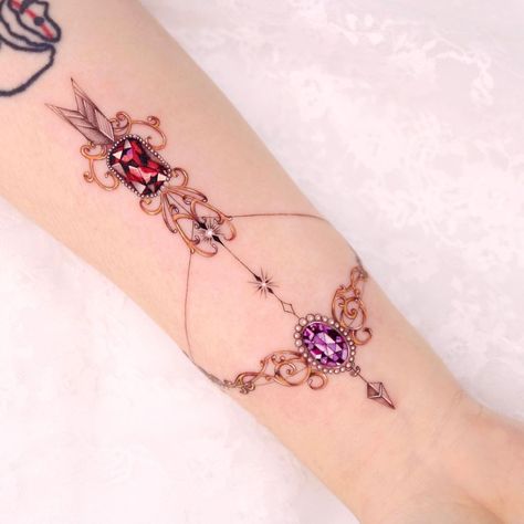 Ornamental Bow Wrist Tattoo Design Wrist Tattoo Design, Bow And Arrow Tattoo, Bow Tattoos, Jewelry Tattoo Designs, Inside Of Arm Tattoo, Arrow Tattoos For Women, Gem Tattoo, Tulip Tattoo, Jewel Tattoo