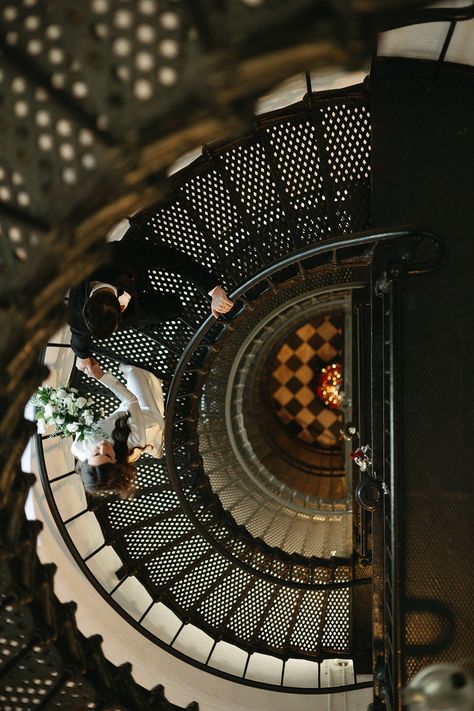 Elopement ideas for editorial wedding photography. St. Augustine Lighthouse is an unconventional wedding venue with a rich history and awe-inspiring views of the Atlantic Ocean. The best time to elope in St. Augustine for lighthouse couples photos with a cinematic photography aesthetic is during sunrise. Find out more. #cinematicphotography #aestheticphotography #documentarystyleweddingphotography #weddingphotography #cinematic photography #lighthousecouplephotos #staugustineweddingphotographer St Augustine Wedding Venues, St Augustine Elopement, St Augustine Aesthetic, St Augustine Engagement Photos, St Augustine Florida Aesthetic, Lighthouse Elopement, Cinematic Photography Aesthetic, St Augustine Lighthouse, Lighthouse Wedding