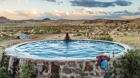 My favorite place is the stone tank on my family ranch, where I’ve made a home, on the side of a rocky hill, halfway between Marfa and Fort Davis. It’s one of the most remote, serene, and beautiful places on the planet, fed by the water underground, and when you stand naked on the tank’s edge, … Liz Lambert, Natural Swimming Ponds, Texas Monthly, Tank Pool, Stock Tank Pool, Swimming Pond, Natural Swimming Pools, Natural Swimming Pool, Small Pools