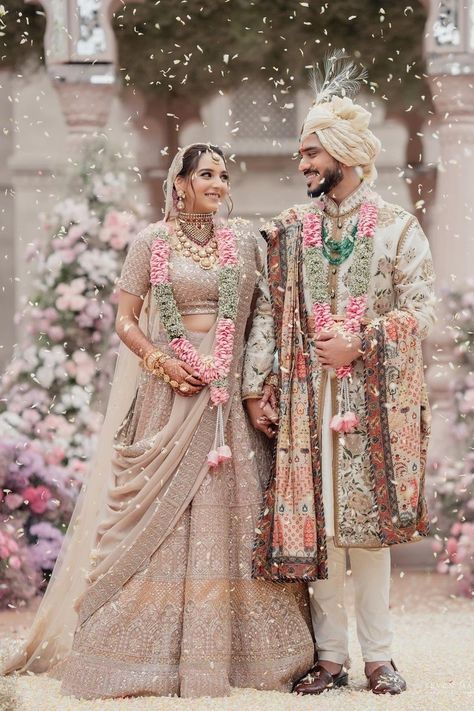 Millennial couples have often flaunted colour coordinated outfits at their weddings & to decode this trend, we have a list of couples in colour-combination outfits for inspo! Bride Groom Wedding Dress Indian, Bride And Groom Colour Combination, Bride And Groom Dress Combination Indian, Pestal Colour Lehanga, Wedding Dress For Couple, Wedding Couple Dress Combination, Wedding Couple Dresses, Wedding Outfit Couple, Wedding Dress Combination