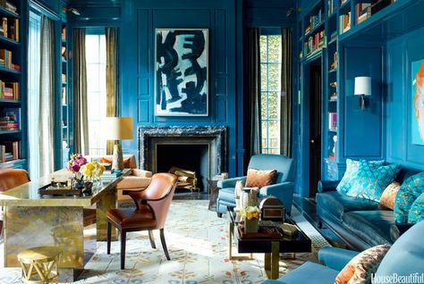 Steven Gambrel ~ Walls in a custom peacock-blue lacquer by Fine Paints of Europe give depth and richness to the library of a Chicago townhouse. Designer Steven Gambrel dialed up color here and throughout the home to compensate for Chicago's long winters. The abstract painting is from Showplace Antique & Design Center. The desk and coffee table are 1960s French pieces. The curtains are End Paper from Stark Blue Library, Fine Paints Of Europe, Lacquered Walls, Chicago House, Boho Lifestyle, Set Sofa, Salou, House Beautiful, Blue Rooms