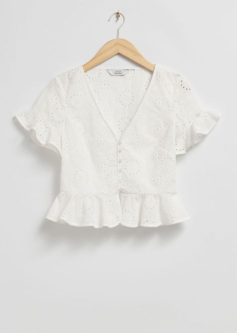 Broderie anglaise frilled blouse crafted from cotton. Designed with allover broderie anglaise floral embroidery with a v-cut neckline and buttoned front with fitted, frilled edge short sleeves and a frilled, slightly flared hemline. Length of blouse: 48cm / 18.9" (EU 36 / UK 8 / US 4) Cute White Tops, Frill Blouse, Frill Tops, Chic Blouses, Simply Chic, Blouse Diy, Puff Sleeve Blouse, Women Shirts Blouse, V Cut