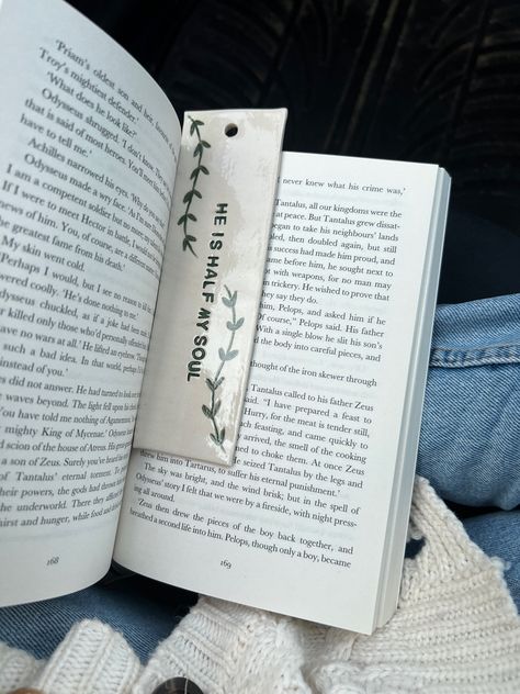 A photo someone’s lap sitting in a car with a book open and a handmade ceramic book mark inside the pages. Air Dry Clay Bookmark, Clay Book Marks, Ceramic Bookmark, Clay Presents, Book Pottery, Ceramic Ideas Pottery, Bookshop Ideas, Clay Bookmark, Clay Book