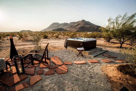 Address: 59875 Lorraine Avenue, Landers, CaliforniaPrice: $360,000Size: 720 square feetBedrooms: 2Bathrooms: 1Oh, to be a homeowner stargazing from a hot tub in the middle of the desert. This so-amazing-it-has-to-be-fake situation could become your reality if you decide to spring for this dreamy cabin for sale in the Mojave. The little house measures only 720 square feet, but packs a lot of modern charm into its two-bedroom, one-bath layout. Desert Tiny House, House In The Desert, A Frame House Kits, Desert Cabin, Brutalist Buildings, Tiny House Interior Design, Cabins For Sale, Mojave Desert, Desert Homes