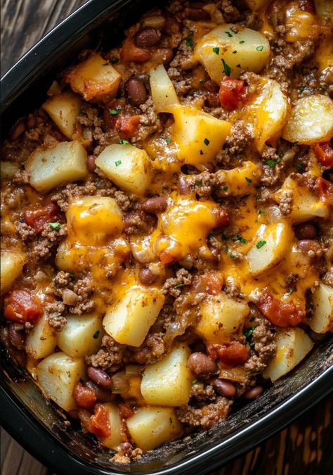 This Slow Cooker Cowboy Casserole is the ultimate comfort food, perfect for busy weeknights or a cozy weekend meal. Packed with ground beef, kidney beans, corn, and savory seasonings, it’s a hearty, one-pot dish that is both filling and flavorful. The addition of sliced potatoes and a melty cheese topping makes it a complete meal […] Cowboy Casserole Recipe, Homemade Bolognese Sauce, Homemade Bolognese, Cowboy Casserole, Beef Kidney, Ground Beef And Potatoes, Potato Dinner, Cozy Weekend, Fresh Potato