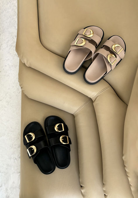 Tayo is a luxe everyday slide, available exclusively to Billini. Complete any off-duty look with this contemporary luxe slide. Featuring; - flat footbed - open round toe with chunky exposed sole - thick twin strap on upper with adjustable buckle fastening - statement chunky buckle in gold hardware - open heel counter - synthetic upper, lining and outsole Available in Black, Cashew, White and Natural Raffia. Available exclusively to Billini. Contemporary Luxe, Open Toed Heels, The Girl Who, Cashew, Off Duty, New Trends, Gold Hardware, Fashion Shoes, Buckle