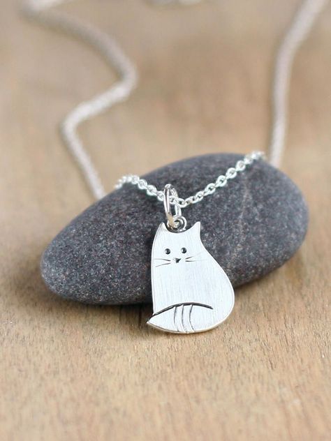 "Thank you for visiting my store, you are looking at little cat pendant of silver. Cute cat made of sterling silver. The little cat is 20 мм/0.78 inches tall and 11мм/0.43 inches wide. Purchase will arrive to you with a black cotton thread. You can order the pendant with a cable chain. And you can choose the length of the chain by yourself to make this set perfect. Lovely pendant could be nice gift for someone special. Chain option: 40 cm / 16 inches, 45cm / 18 inches, 50cm / 20 inches or 55cm / Cat Carving, Silver Cat Pendant, Cat Necklace Silver, Necklace Cat, Tiny Necklace, Sterling Silver Cat, Cat Pendant, Silver Jewelry Design, Silver Cat