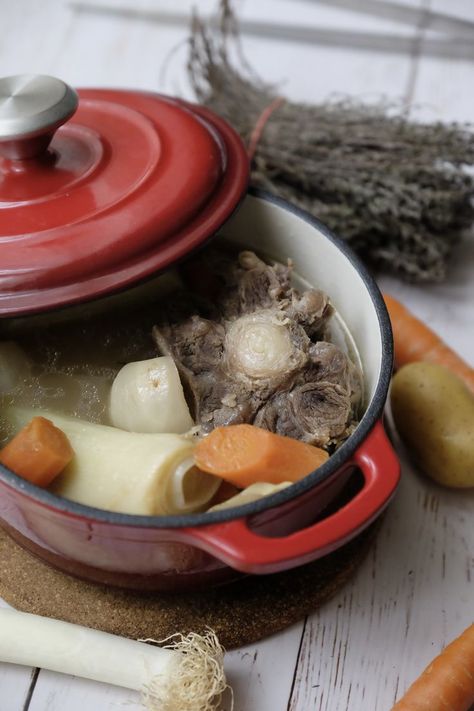 If you're well-versed in French cuisine, then there's a pretty good chance you've made (or at least have heard of) pot-au-feu. The soup incorporates beef and vegetables, making it a classic French take on beef stew. #stew #soup #potaufeu #oxtail #oxtailsoup Oxtail Soup Recipe, Beef And Vegetables, Oxtail Soup, Stew Soup, Leftovers Soup, Beef Cheeks, European Recipes, Chopped Carrots, Course Meal