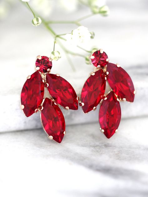 Ruby Earrings, Ruby Red Earrings, Bridal Ruby Earrings, Swarovski Ruby Earrings, Bridesmaids Earrings,Cluster Ruby Earrings, Ruby Jewelry  Dazzling post Crystal earrings feature a cushion cut crystal surrounded by petite crystals set on a secure prong settings. The perfect shade for cocktail parties or to add a touch of color to your wedding ensemble  Petite Delights is an Official SWAROVSKI® Branding Partner Our brand is legally licensed & authorized By Swarovski Company for high quality... Red Statement Earrings, Bridesmaids Earrings, Crystal Bridal Earrings, Geode Earrings, Garnet Red, Ruby Earrings, Ruby Jewelry, Studs Earrings, Earrings Red