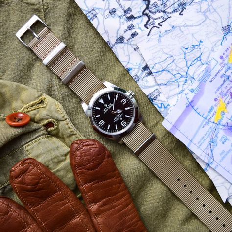 Rolex Explorer 214270 on a TAN Nato strap next to leather gloves and field gear. Atelier de Griff Rolex Explorer Nato Strap, Rolex Explorer Leather Strap, Rolex Explorer 36mm, Rolex Explorer Ii White, Watch Photography, Men's Rolex, Stainless Steel Rolex, Gentleman Watch, Used Rolex