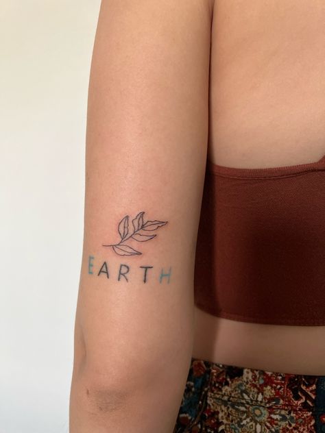 Matching Earth Sign Tattoos, Earth Word Tattoo, Earthy Boho Tattoos, Earth Art Tattoo Word, Down To Earth Tattoo Ideas, Earth Outline Tattoo, Earthy Girl Tattoos, Earth Tattoos For Women, Environmentalist Tattoo