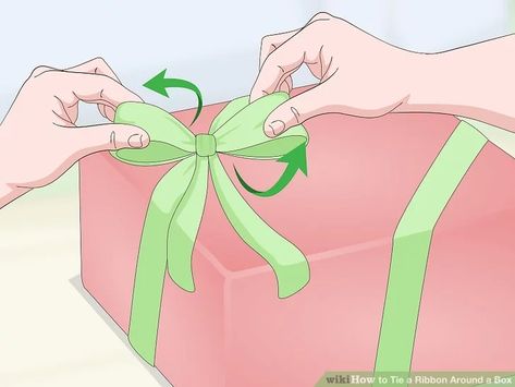 3 Ways to Tie a Ribbon Around a Box - wikiHow Ways To Tie A Ribbon, Ribbon On Presents, Christmas Present Ribbon, Bows For Presents, Diy Gift Bow, Ribbon Box, Fancy Bows, Gift Wrapping Techniques, How To Tie Ribbon