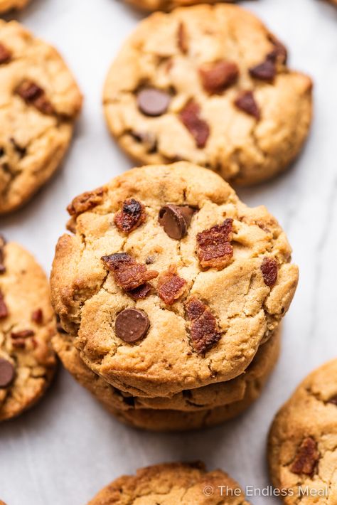 Bacon peanut butter cookies are THE BEST cookies ever. They're soft and chewy and packed with an incredible salty/smoky/sweet flavor from the bacon, bourbon, and peanut butter. It's the perfect combination and makes for one amazing cookie! #theendlessmeal #cookies #baconcookies #peanutbuttercookies #peanutbutterbaconcookies #bacon #peanutbutter #bestcookies #cookierecipe Whiskey Cookies, Bacon Chocolate Chip Cookies, Bacon Desserts, Bacon Cookies, Bourbon Bacon, Hazelnut Recipes, Best Cookies Ever, Spice Cookies, Chewy Cookie