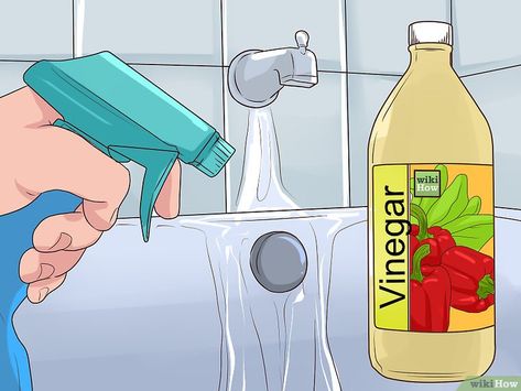 3 Ways to Clean Tough Stains from a Bathtub - wikiHow How To Remove Caulking, Bathtub Caulking, Bathtub Cleaner, Silicone Caulk, Housekeeping Tips, Clean Bathtub, Global Textiles, Hard Water Stains, Acrylic Bathtub