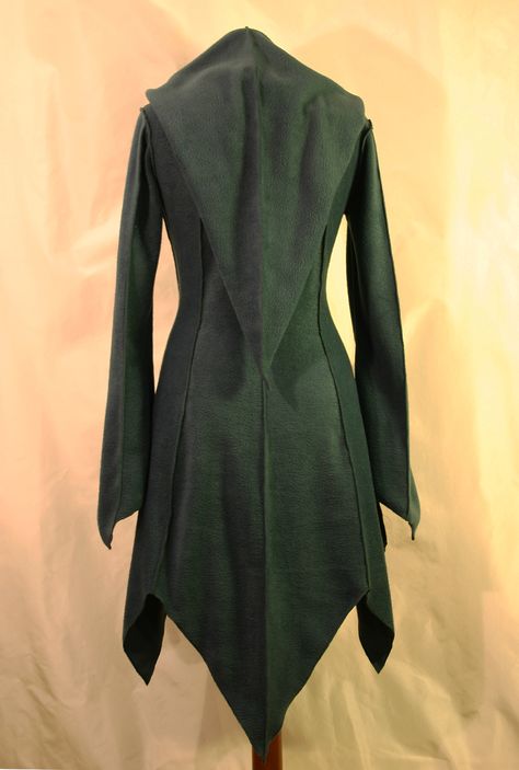 Dark green longer at back pointy hem fleece coat with long pixie hood. Elvish Clothing, Elven Coat, Elven Clothes, Hood Sewing Pattern, Elvish Style, Nerium Oleander, Slytherin Fashion, Hoodie Sewing, The Pixies