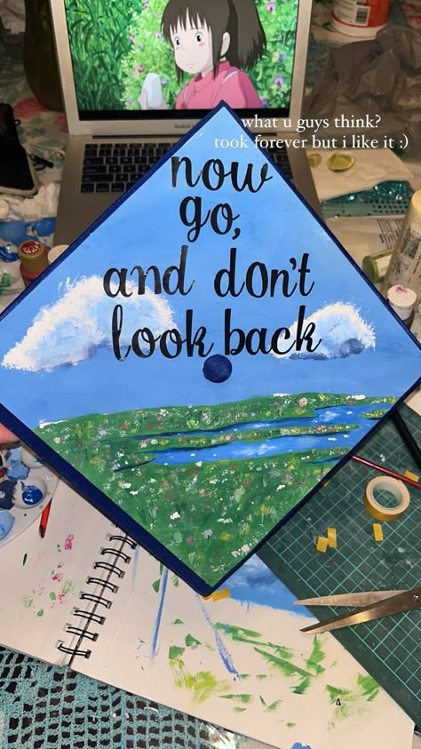 2023 grad cap that i painted Watercolor Graduation Cap, Genshin Impact Graduation Cap, Art Grad Cap, Graduation Cap Designs Painted, Painting Graduation Cap, Graduation Cap Designs Studio Ghibli, Nerdy Graduation Cap, Grad Cap Painting Ideas, Painted Grad Cap Ideas