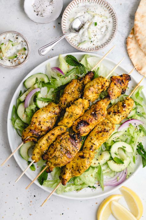 Grilled Chicken Skewers with Indian Marinade and Cucumber Raita (250 calories or 3 WW points) - Marinate chicken breast in this fragrant and flavor-packed Indian marinade for a delicious, summery Indian meal. Made with curry powder, turmeric, coriander, garlic, lemon, and cilantro, the marinade recipe infuses the chicken skewers with lots of rich, warm, complex flavor. Add a cool, refreshing cucumber raita (yogurt sauce) to round out the meal! Indian Marinade, Chicken Breast Tenderloins, Marinate Chicken, Cucumber Raita, Indian Meal, Yogurt Chicken, Grilled Chicken Skewers, Marinating Chicken Breast, Ww Points