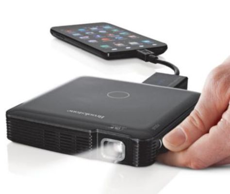 Tech - Pocket Projector | The Gentleman's Journal | The latest in style and grooming, food and drink, business, lifestyle, culture, sports, restaurants, nightlife, travel and power. Drink Business, Pico Projector, Projector Tv, Smartphone Gadget, Hissy Fit, Cool Electronics, Smartphone Holder, Business Lifestyle, Energy Technology