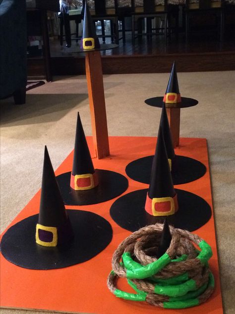 Halloween Witch Hat Ring Toss Halloween Hanging Witch Hats, Witch Hat Ring Toss, Witch Hat Toss Game, Halloween Ring Toss, Giant Witch Hat, Witch Trunk Or Treat Ideas, Halloween Carnival Games, Trunker Treat Ideas, Halloween Safety