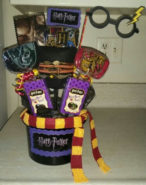 Harry Potter bucket / bouquet Harry Potter Basket, Bucket Bouquet, Christmas Gifts For Harry Potter Fans, Harry Potter Broach Bouquet, Harry Potter Gift Basket, Harry Potter Whiskey Decanter Set, Burr Basket, Arcade Games, Creative Gifts