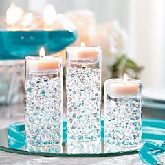 Wedding Centerpieces & Table Decorations | Oriental Trading Company Pretty Wedding Centerpieces, Trunk Party, Beautiful Wedding Centerpiece, Anniversary Flowers, Water Beads, Diy Centerpieces, Candle Centerpieces, Vase Centerpieces, Floating Candles