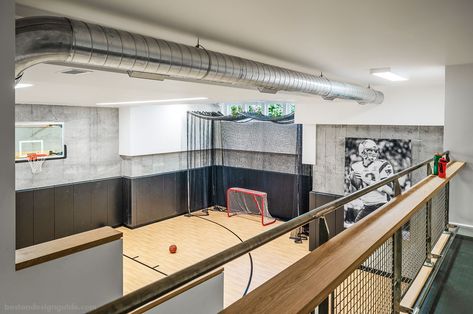 Basement sport court by Flavin Architects Mini Basketball Court Basement, Indoor Sport Court Ideas, Basement Sport Court, Underground Basketball Court, Indoor Multi Sport Court, Basement Basketball Court, Indoor Sports Complex Design, Home Sports Court, Indoor Sports Court