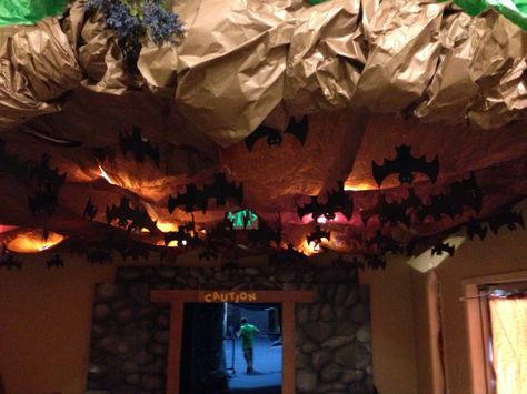 Cave Quest VBS. Nazarene Caverns. Bat cave Classroom Cave Ideas, Bat Cave Halloween Decorations, Bat Cave Transformation, Cave Classroom Decorations, Cave Classroom Transformation, Diy Bat Cave, Classroom Bat Cave, Caveman Party Ideas, Bat Cave Classroom