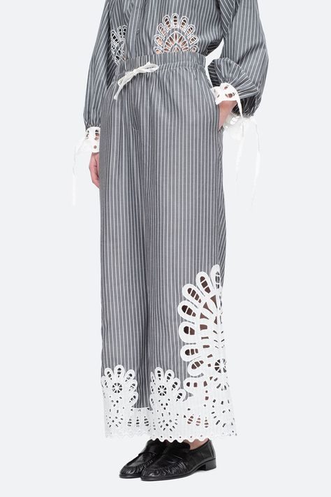 The Cassidy Eyelet Pants in Gray by Sea New York are a drawstring, wide leg pant crafted in a striped cotton fabric with oversized eyelet detailing. Eyelet Pants, Sea New York, Sea Ny, Something Went Wrong, Wide Leg Pant, Fall Floral, Scandinavian Style, Free Shopping, Modern Woman