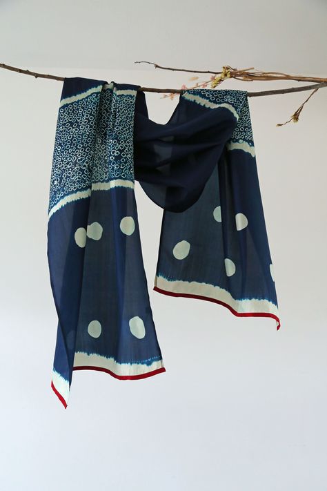 Intricately detailed from end to end, hand dyed in fine weave silk.~ PRODUCT SPEC: Bangalore silk scarf lovingly detailed and hand dyed by talented women artisans with many years of experience, in deep Indigo with intricate Bandhani and Itajime dye technique. The size is; 55 x 185 CM approx ~ THE STORY: Excited to reintroduce Namrata Shah. A multi talented creative as she’s gained a fruitful 5 years of first hand experience within the handloom industry after completing her education in Textile D Shibori Scarf, Scarf Display, Holiday Scarves, Shibori Techniques, Dye Techniques, Tie Dye Crafts, Suit Ideas, Handloom Fabric, Deep Indigo