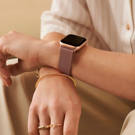 Milanese Loop Apple Watch Band Our Milanese Apple Watch band offers a touch of sophistication and class on your wrist. Inspired by designs created in Milan in the late 19th century, this Milanese mesh bracelet is a timeless work of art. Its metal buckle gently wraps around the wrist, offering a minimal and sophisticated look . Thanks to its magnetic closure system , you can adjust the strap precisely for personalized comfort. #aunomay #watchband #applewatch Apple Watch Bands Women, Apple Watch Stand, Rose Gold Apple Watch, Valentines Gift Guide, Gold Apple Watch, Resin Bracelet, Vintage Rose Gold, Gold Apple, Apple Watch Accessories