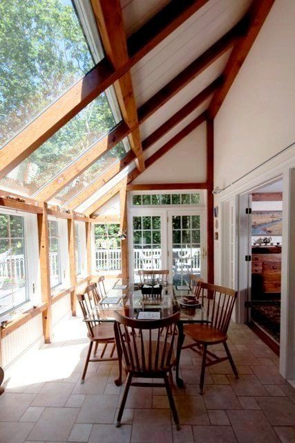 Post & Beam Breakfast/Dining Room by Yankee Barn Homes Dining Room With Doors To Outside, Solarium Dining Room, Dining Room Addition Off Kitchen, Sunroom Dining Room Off Kitchen, Sunroom Addition Off Kitchen, Conservatory Dining Room Ideas, Post And Beam Barn Homes, Dining Room Extension, Lean To Conservatory