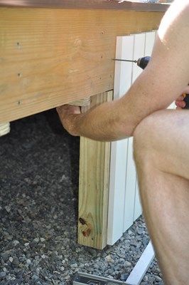 Installing Composite Deck Skirting and Fascia | Decks.com Composite Deck Skirting, Low Level Deck, Under Deck Storage, Deck Skirting, Laying Decking, Deck Makeover, Deck Storage, Composite Deck, Deck Construction