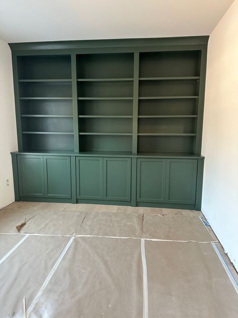 Wooden Built Ins, Green Bookshelf Wall, Built In Bookshelves Half Wall, Blue Green Built Ins, Built In Cabinet Wall, Bookshelf Built In Wall, Built In Shelves Living Room Green, Deep Green Bookshelves, Built In Bookshelves Green